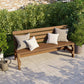Modern garden bench seat stained brown with tan and white cushions | Wooden outdoor furniture NZ