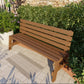 Afternoon sun falling over a modern garden bench seat stained brown. For sale now in NZ | Wooden outdoor furniture NZ