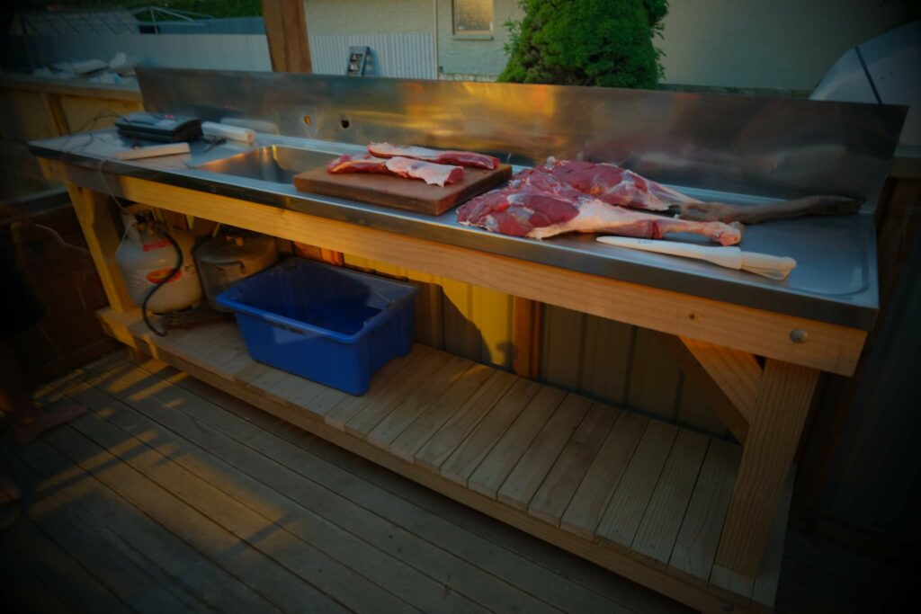 FIlleting bench being used for to break down a red deer after a successful hunting trip. 